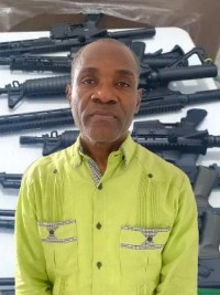 Haiti - Arms traHaiti - Arms trafficking : The Reverend Father Fritz Désiré placed in policefficking : The Reverend Father Fritz Désiré placed in police custody